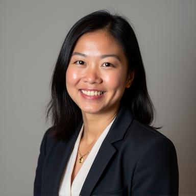 Professional headshot of Sarah Chen, a smiling woman with glasses.